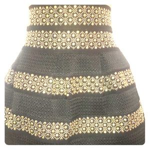 Black pleaded with gold studs